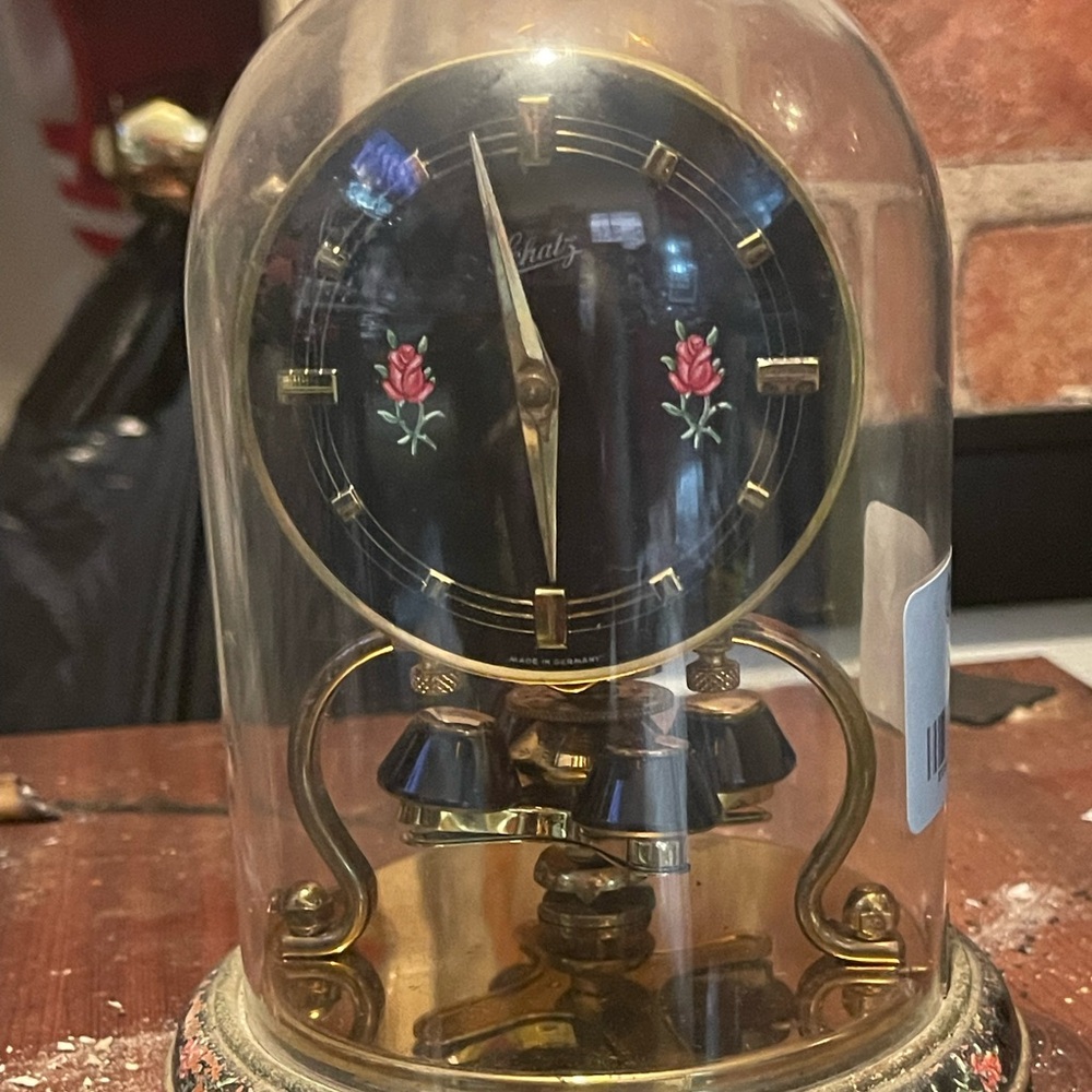 Elegant Black and Gold Dome Clock with Floral Design